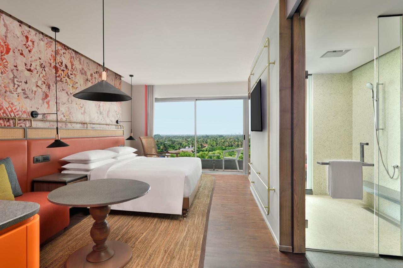 Standard King Room with Balcony – Spacious 538 Square Feet Room with Happy Hours from 11 AM to 6.30 PM